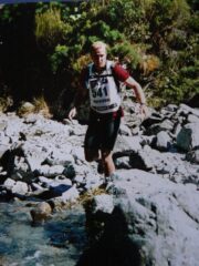 An athlete competes in the Coast to Coast mountain run.